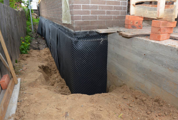 Happy homeowners after waterproofing job in Pandora